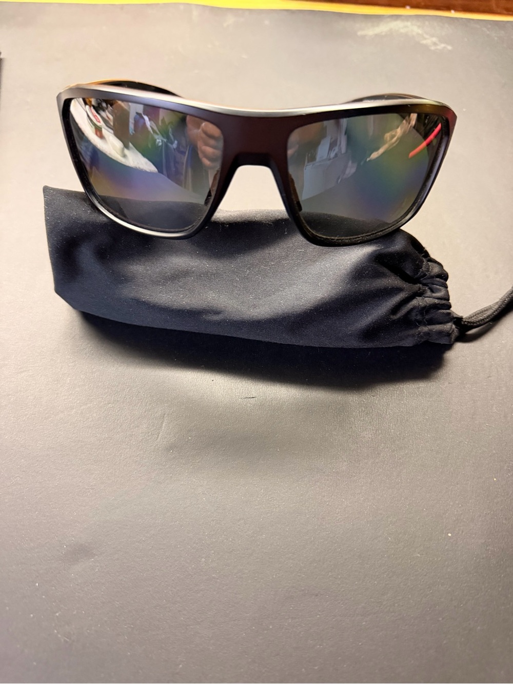 Oakley Black Frame Sunglasses with Mirrored Lenses